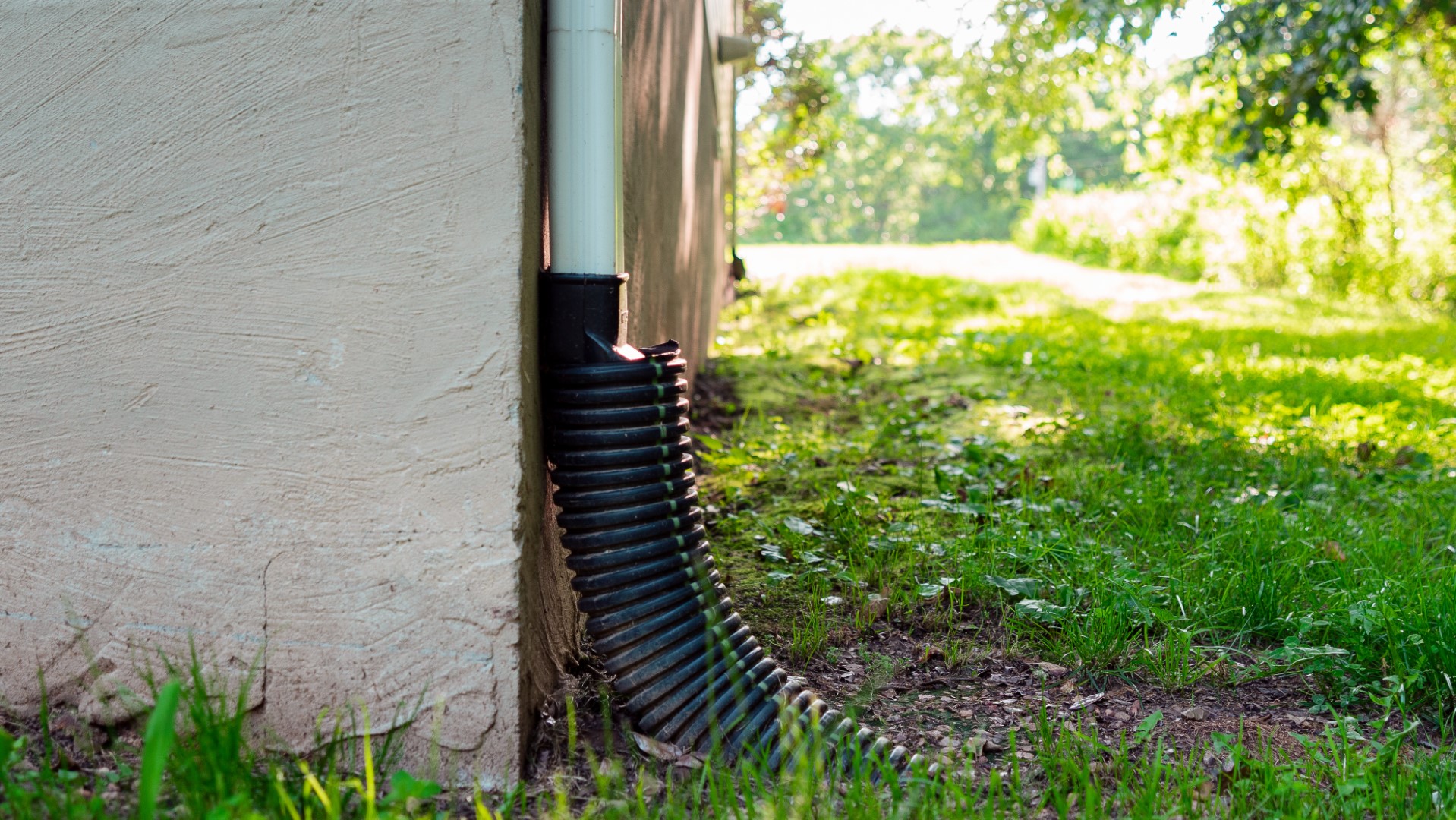 Downspout underground to yard