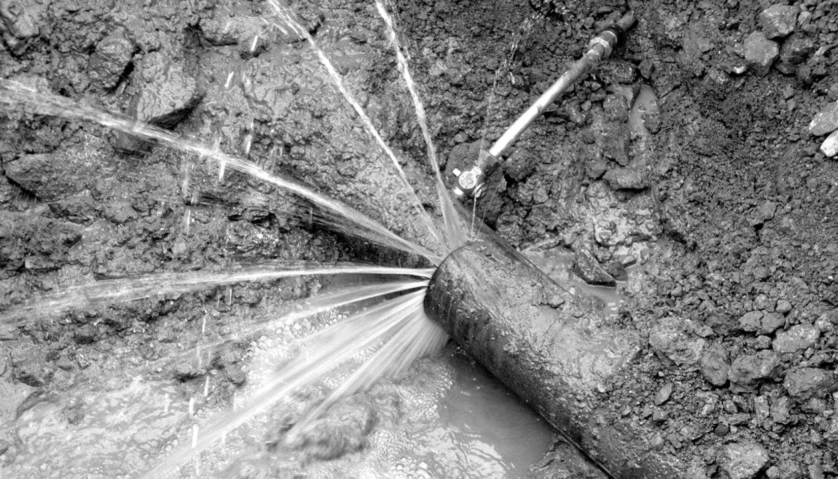 Water squirting out of a water pipe