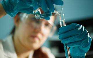 Banner Image - Blue-Green Algae Monitoring - Water Test in a Lab - Female Scientist - AdobeStock_135365154