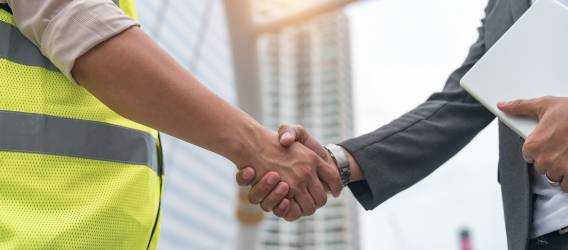 Contractor and Engineer Shaking Hands