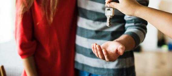 Couple Getting Keys to New Home