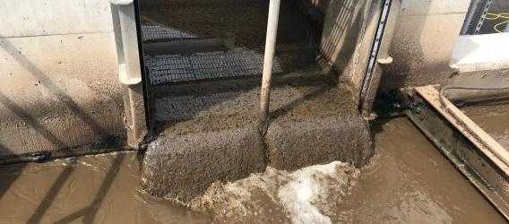 Wastewater Flowing into Flock Tanks at a Wastewater Treatment Plant